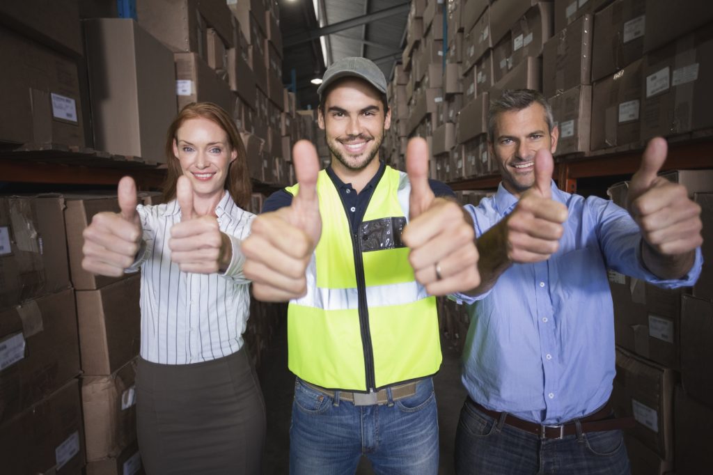 Warehouse Team Smiling at Camera iStock_000047260930_Medium