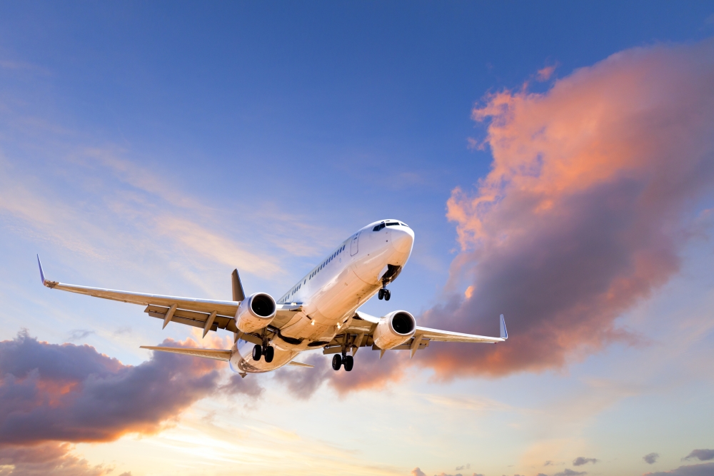 Aeroplane Coming in to Land at Sunset - Boeing 737 coming in to land at sunset.